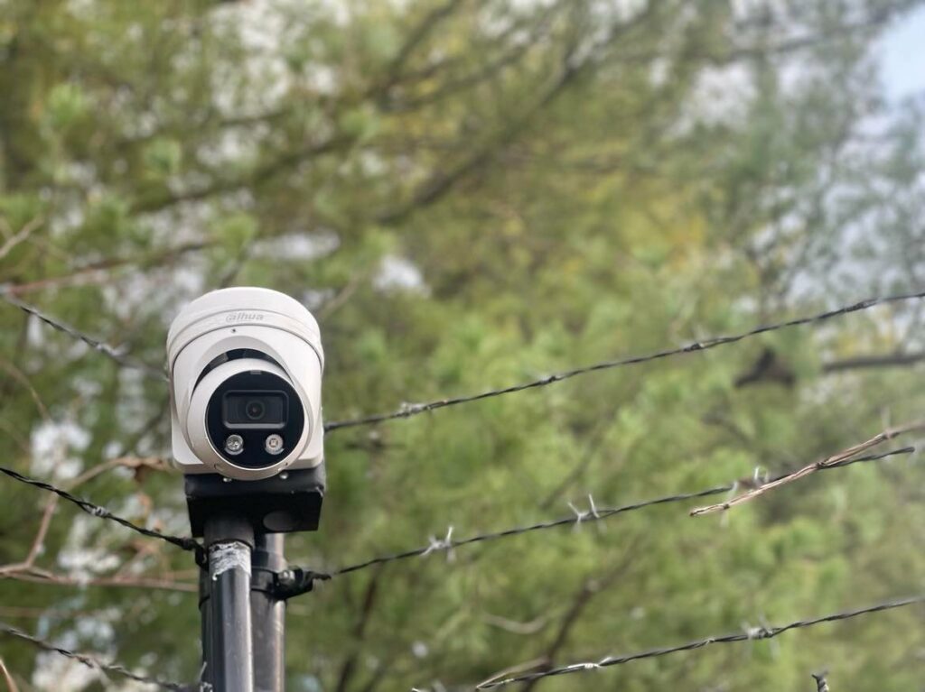 Outdoor camera - barb wire fence